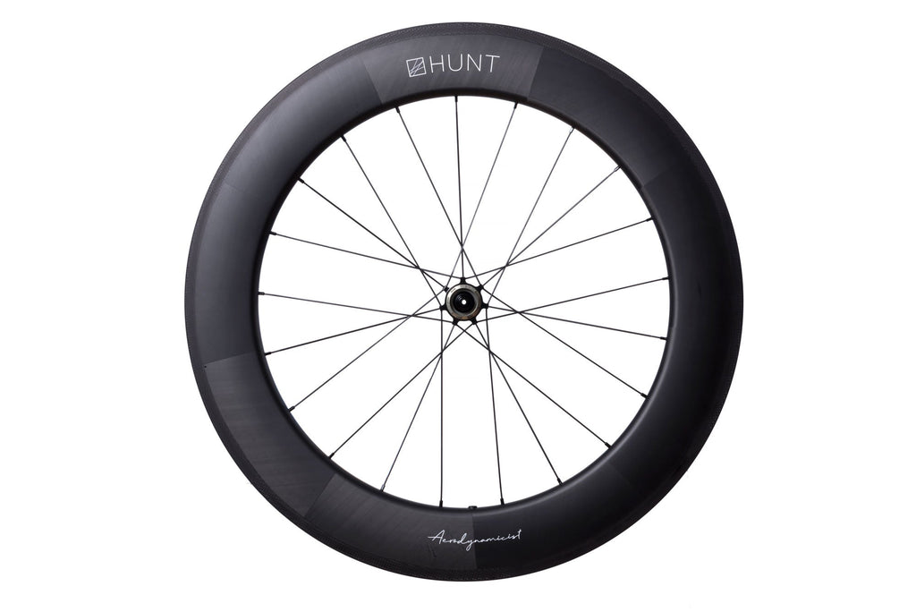 <h1>AERODYNAMICIST PROFILE</h1><i>The benefits of blunted spoke bed areas revolve primarily around the predictable airflow, with the wind ‘hugging’ the rim as it passes across it (as opposed to older style V-shaped rims, which would create turbulence in the form of stalls). The wider profile ensures the flow stays attached to the surface as long as possible before the point of separation, which is key as yaw angles increase.</i>