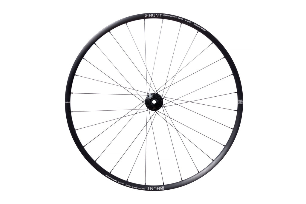 <h1>Rims</h1><i>Strong and light 6066-T6 (+34% tensile strength vs 6061-T6) heat-treated rim features an asymmetric shape which is inverted from front to rear to provide balanced higher spoke tensions meaning your spokes stay tight for longer. The profile is disc-specific, allowing higher-strength to weight as no reinforcement is required for a braking surface. The extra wide rim at 29mm (25mm int) creates a great tyre profile with wider 35c+ tyres, giving excellent grip and lower rolling resistance.</i>